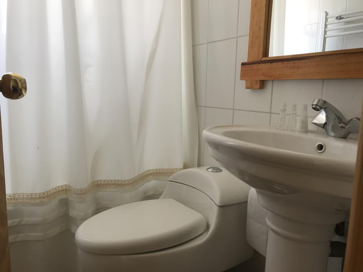 Hostal Los Pioneros Пуэрто-Наталес Экстерьер фото